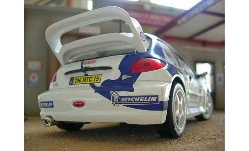 Peugeot 206 WRC 1/18 Solido 1999 # 15 Clarion Panizzi weiss modellautos