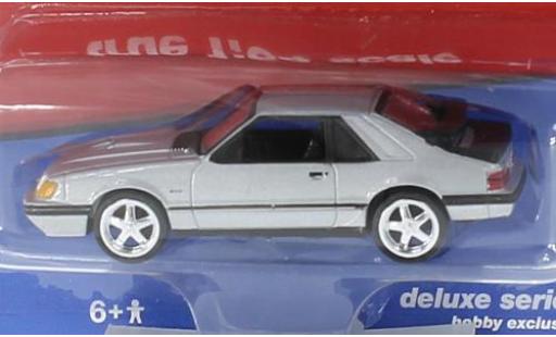 Ford Mustang 1/64 Auto World SVO silber 1984 modellautos