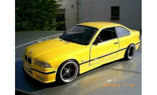 Bmw M3 coupe 1/18 Ut Models jaune E36 jantes ac schnitzer 18 pouces modellautos