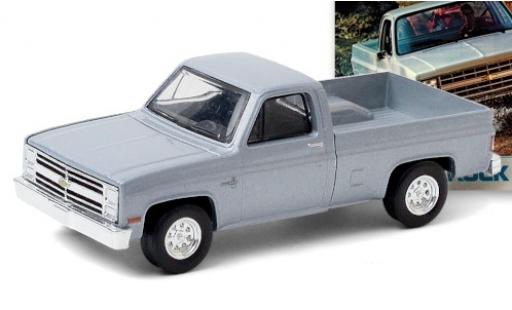 Chevrolet Silverado 1/64 Greenlight mettalic grau 1985 modellautos