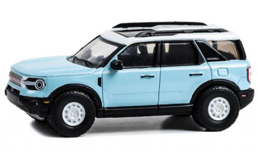 Modellautos Ford Bronco 1/64 Greenlight Sport Heritage limited Edition bleu clair/blanche 2023 Ford Bronco 1/64 Greenlight Sport Heritage limited Edition bleu clair/blanche 2023 modellautos