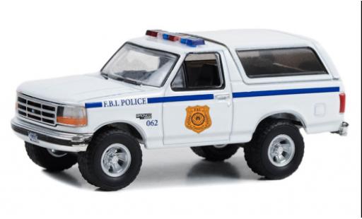 Ford Bronco 1/64 Greenlight XL FBI Police 1996 modellautos