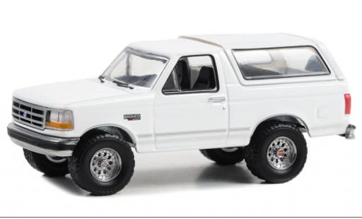 Modellautos Ford Bronco 1/64 Greenlight XLT blanche 1993 Ford Bronco 1/64 Greenlight XLT blanche 1993 modellautos