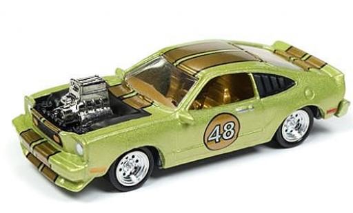 Ford Mustang 1/64 Johnny Lightning II Cobra mettalic grün/gold The Spoilers 1976 tuning sans Vitrine modellautos