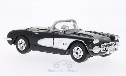 Chevrolet Corvette 1/24 Motormax (C1) schwarz/weiss 1959 ohne Vitrine modellautos