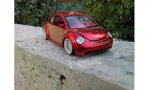 Volkswagen New Beetle Base 1/18 Burago low rider modellautos