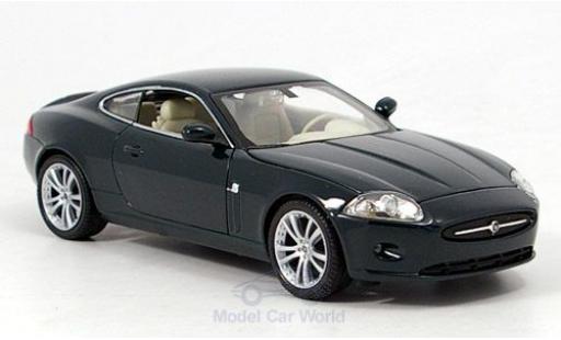 Modellautos Jaguar XK 1/24 Welly 150 Coupe mettalic grün ohne Vitrine Jaguar XK 1/24 Welly 150 Coupe mettalic grün ohne Vitrine modellautos